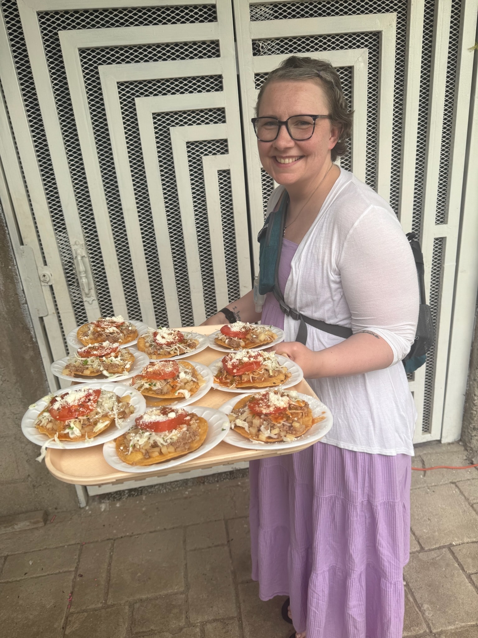 Volunteer serving food to the community in Honduras