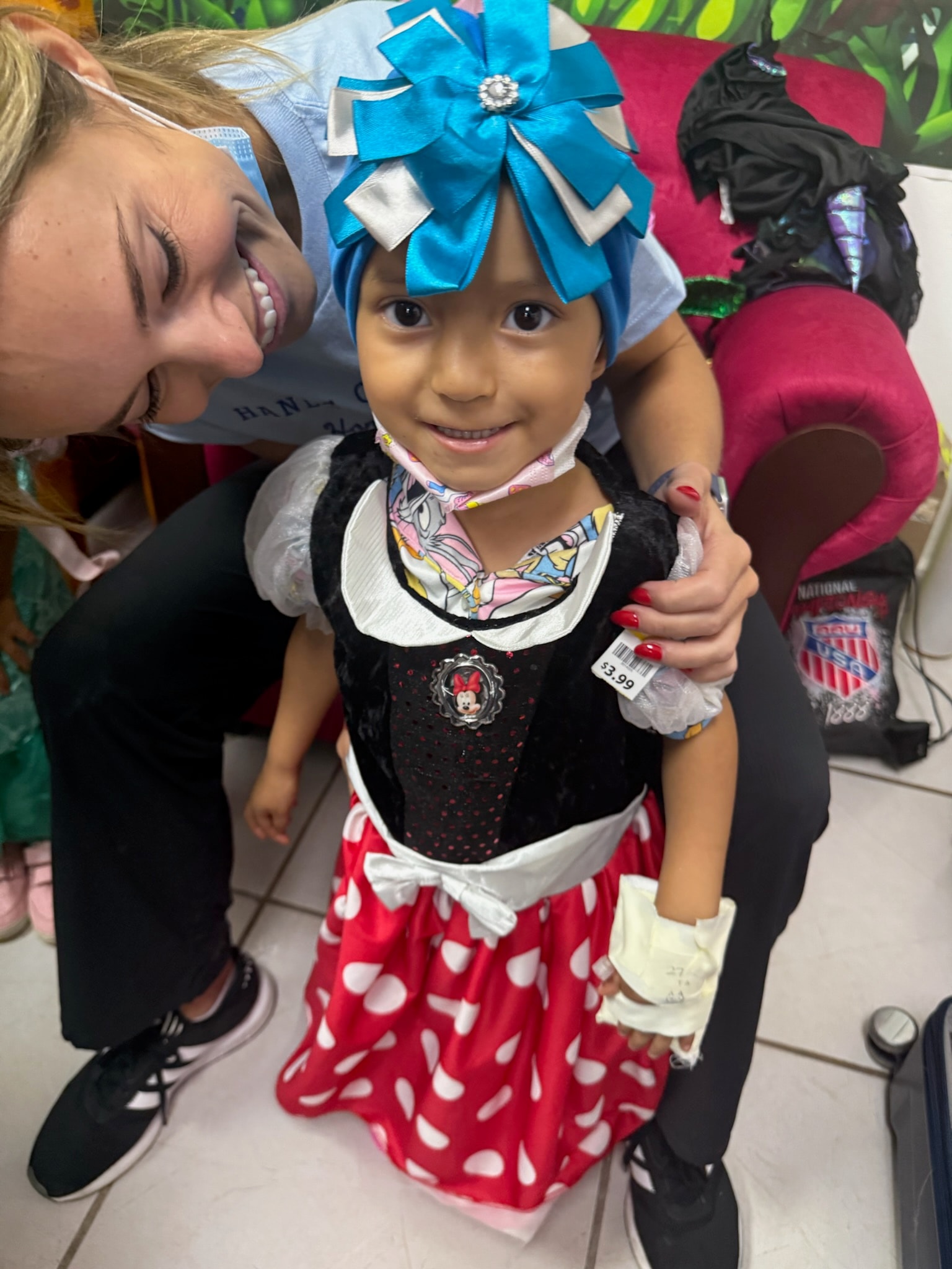 Young girl in a Minnie Mouse costume — joy in the community