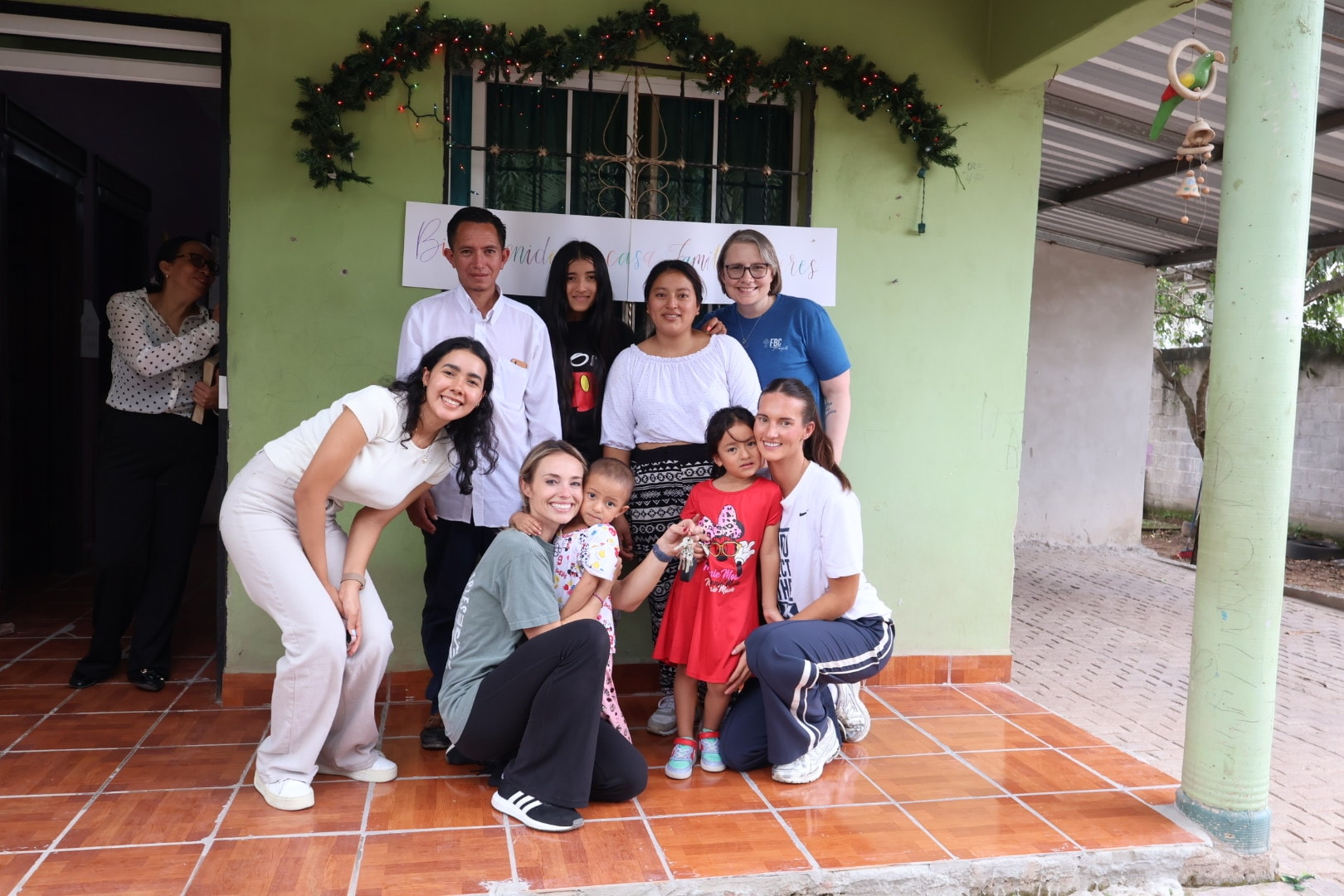 Group gathered together on a decorated porch